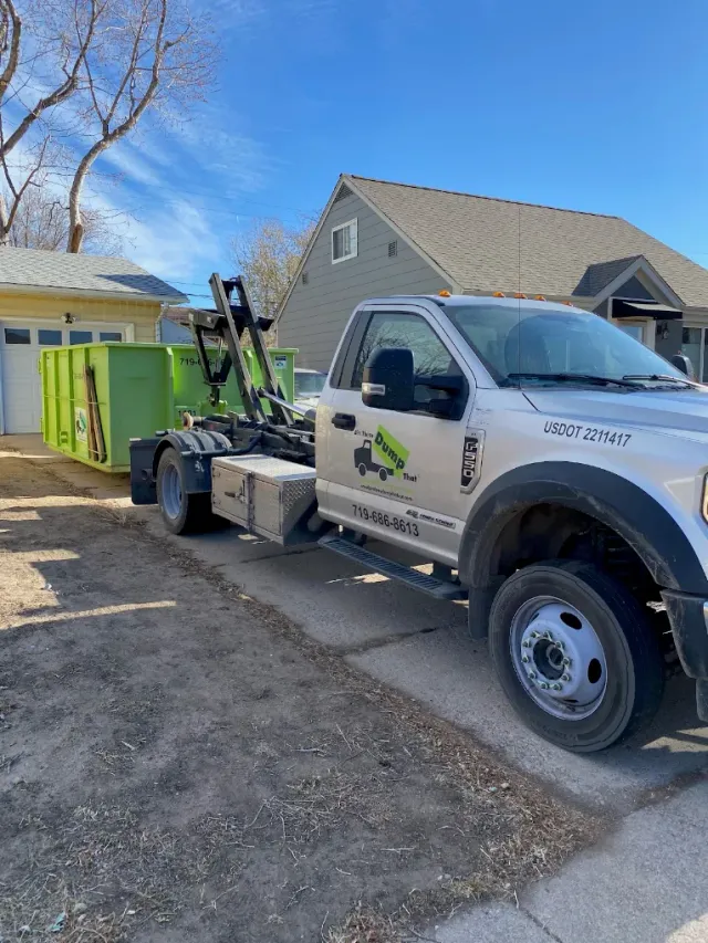 BTDT truck placing a dumpster